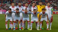 Sebelas pemain timnas Montenegro berseragam putih berfoto sebelum laga kualifikasi Euro 2020